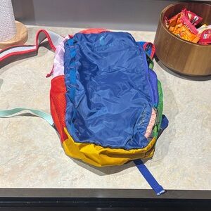 Cotopaxi Multicolor Backpack with Blue and Yellow